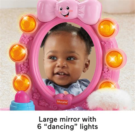 Discovering Self-Awareness with Fisher Price's Mirror: Music and Magical Effects